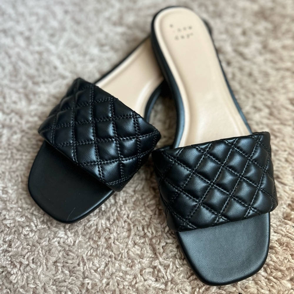 Black slip on sandals